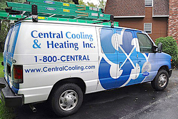 Central Cooling & Heating work van providing exceptional service for an HVAC customer.
